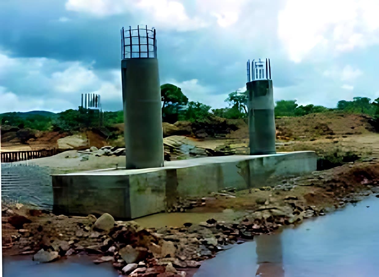 Bridge piers under construction over a river